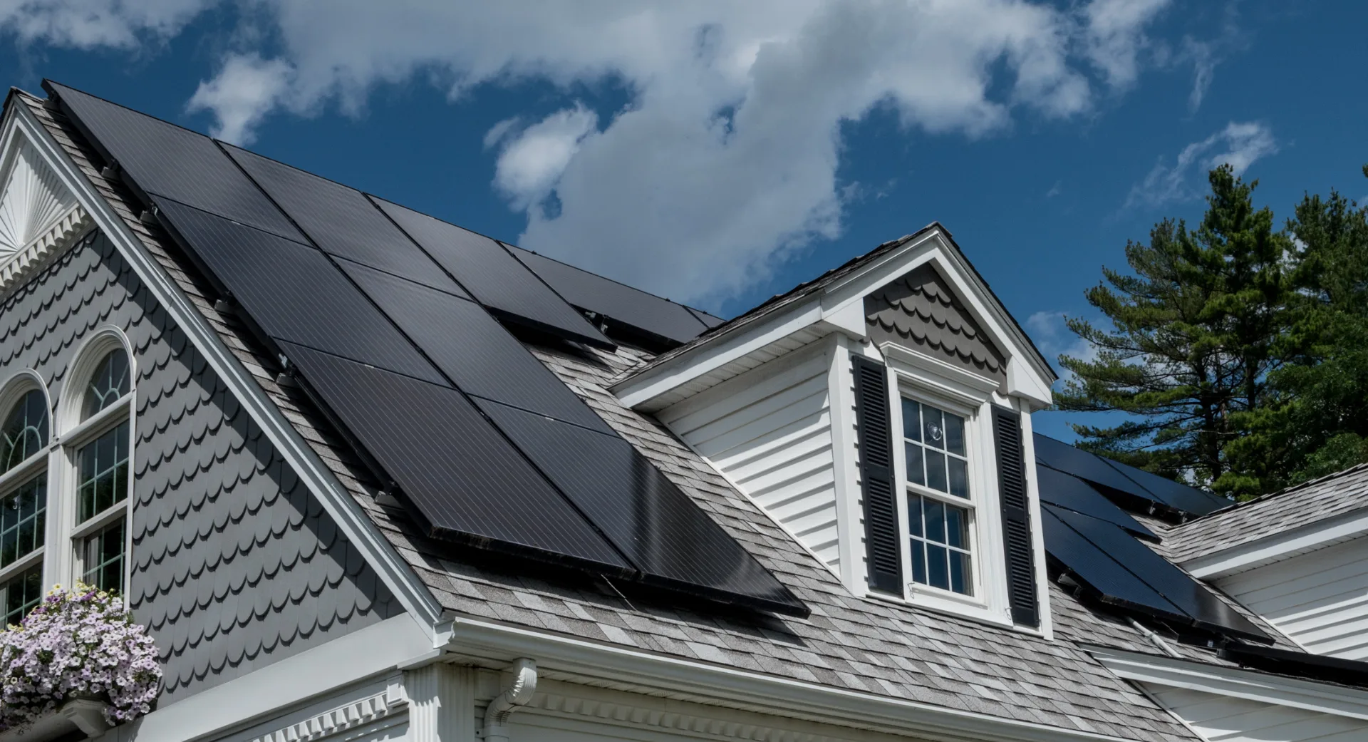 Black solar panels on a house roof